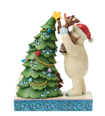 Bumble Holding Rudolph by Tree