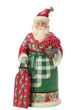 Highland Santa Standing Next To Sled Figure